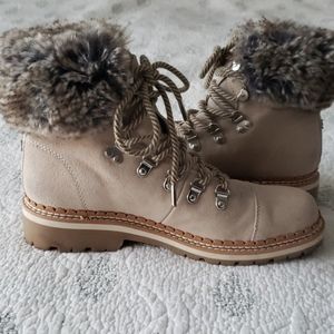 Tan Sam Edelman winter boots with faux fur trim.